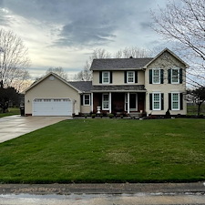 Thorough-House-Wash-and-Pressure-Washing-on-a-vinyl-sided-home-walkway-and-driveway-in-Canton-Oh 0