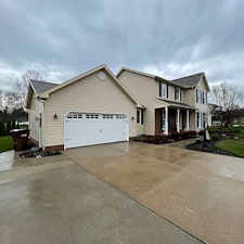 Thorough-House-Wash-and-Pressure-Washing-on-a-vinyl-sided-home-walkway-and-driveway-in-Canton-Oh 1