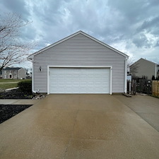 Professional-Pressure-Washing-and-Soft-Washing-on-a-vinyl-sided-home-walkway-and-driveway-in-Sheffield-Lake-Oh 0